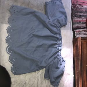 Light blue top. Never worn.